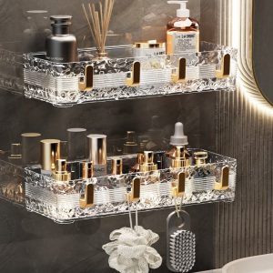 Acrylic Wave Patterned Storage Shelf with gold colored hooks.